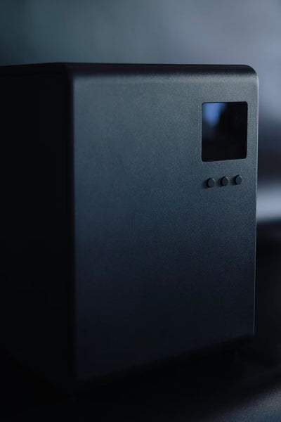 Close-up of the PureFluxion P1 display and three front control buttons
