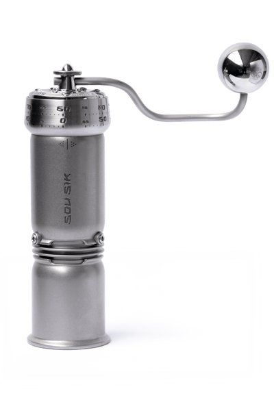 SOU SIK stainless steel manual coffee grinder with LeBrew Burrs 01 system, showing the hand coffee grinder design and burr structure details.

